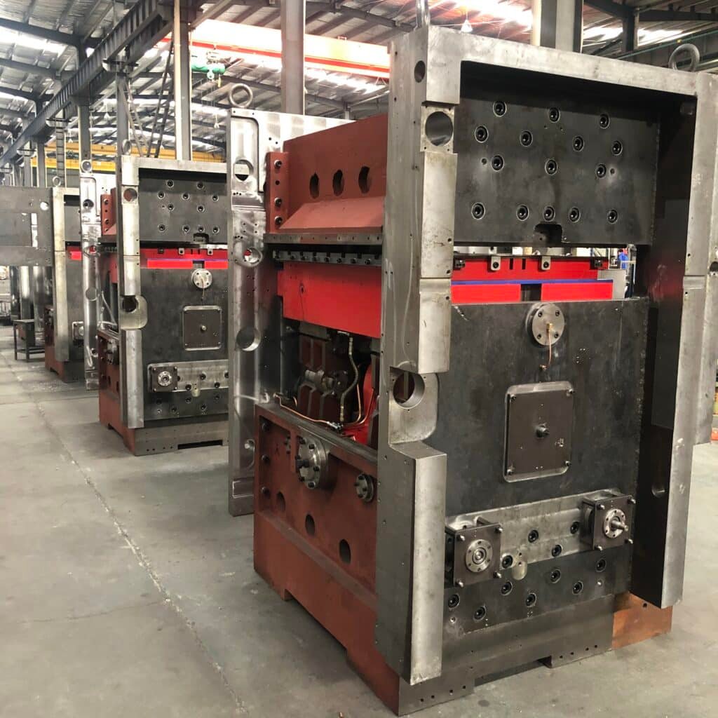 Robust frame and base structure of a heavy-duty platen die cutter, designed to minimize vibration and provide a stable platform for high-precision cutting.