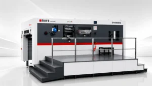 DAI'S D1060SQ Fully Automatic Flatbed Die-Cutting Machine, white body with red stripe, equipped with operating platform and safety guardrails, suitable for die-cutting and creasing of paper products such as boxes, cartons, and labels.