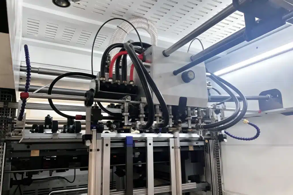 Automatic die cutting feeder system for printing and packaging production line