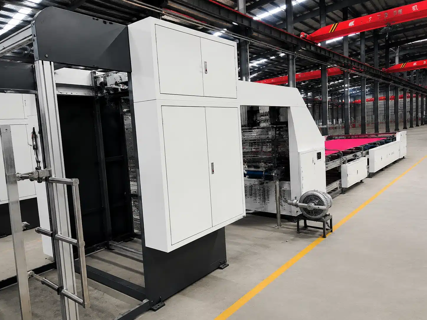 DS-1650 automatic laminating machine installed in DAIS factory for industrial paperboard processing
