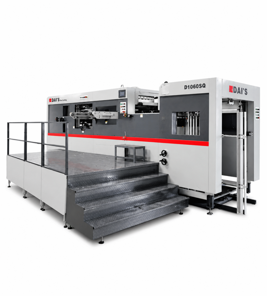 Industrial automatic flatbed die cutting machine with visible ductile iron frame and platen section used for paperboard packaging production